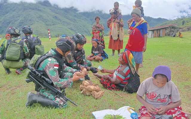 Satgas Yonif 310/KK, pasar tradisional Kiwirok, normalitas pasar, kegiatan sosial, pegunungan Bintang